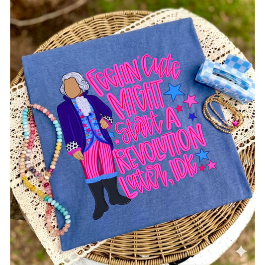 Blue t-shirt with graphic design and text on a woven surface