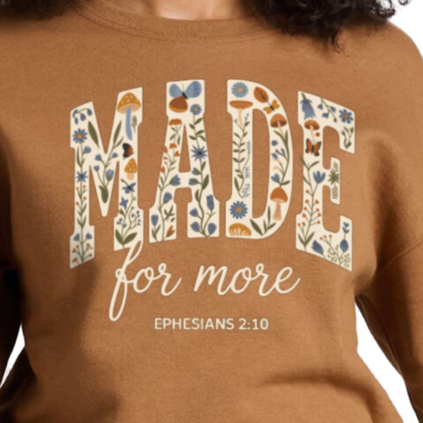 S, M, L, XL, 2XL, 3XL, Christian fall sweatshirt in golden pecan with ‘made for more’ design and Bible verse Ephesians 2:10