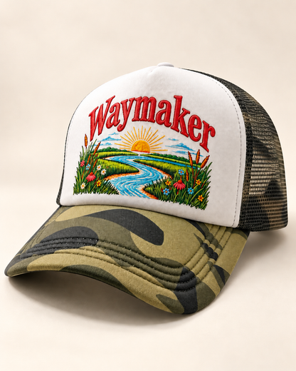 Waymaker white front M81 Woodland camo foam trucker hat with washed vintage red lettering and river sunrise design