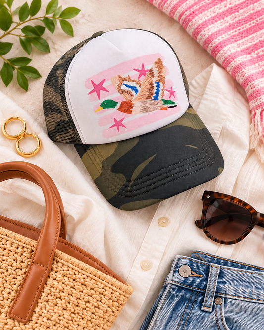 Styled mallard pink stripe woodland trucker cap