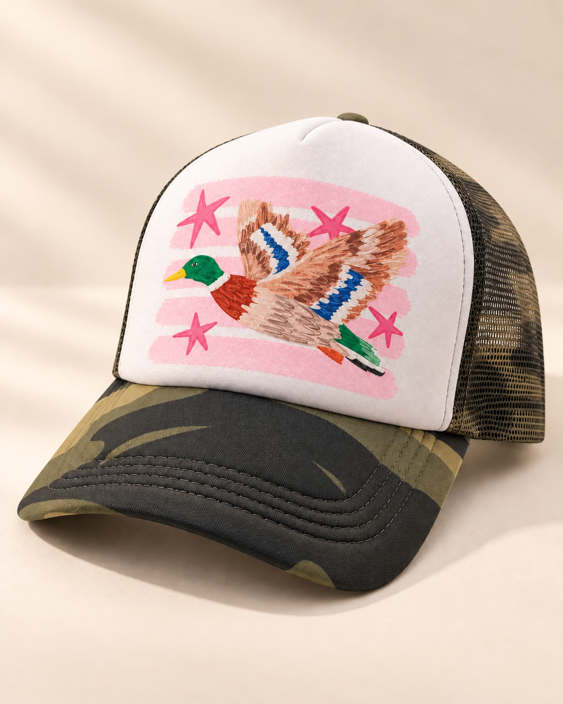 Three-quarter view pink mallard snapback woodland camo bill