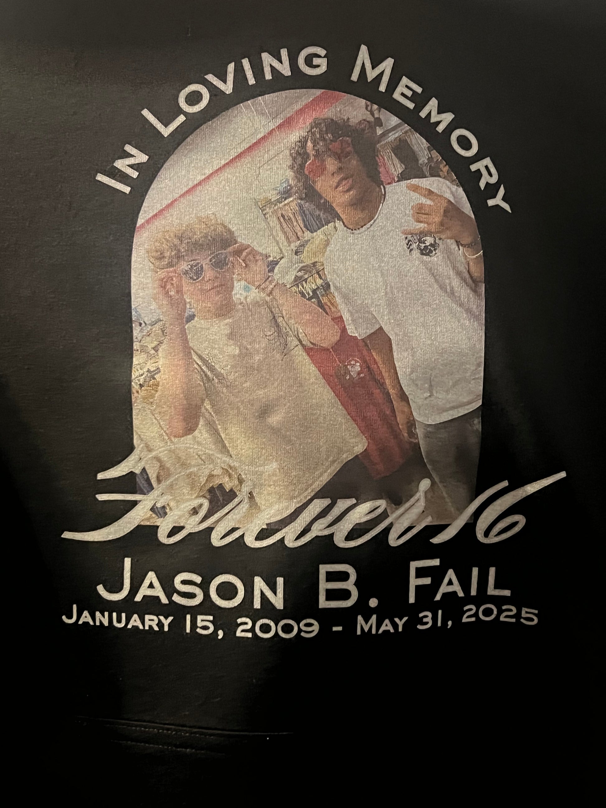 Memorial t-shirt with a photo of a couple and text about Jason B. Fail.