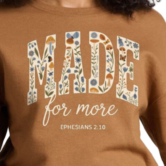 S, M, L, XL, 2XL, 3XL, Christian fall sweatshirt in golden pecan with ‘made for more’ design and Bible verse Ephesians 2:10