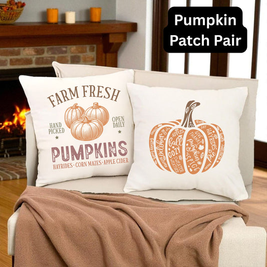 Pumpkin Patch Pair | A pair of Pumpkin themed throw pillows sitting on a chair in a living room decorated for fall