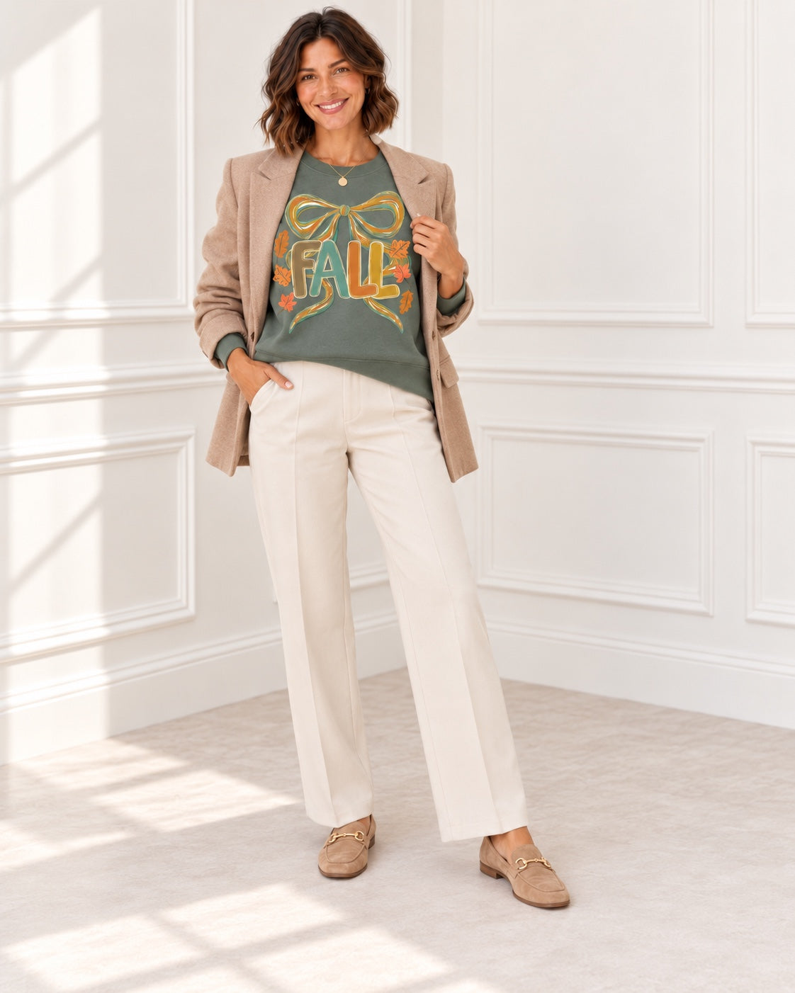 Fall coquette bow graphic sweatshirt in heather sport dark green styled with tan blazer and cream trousers