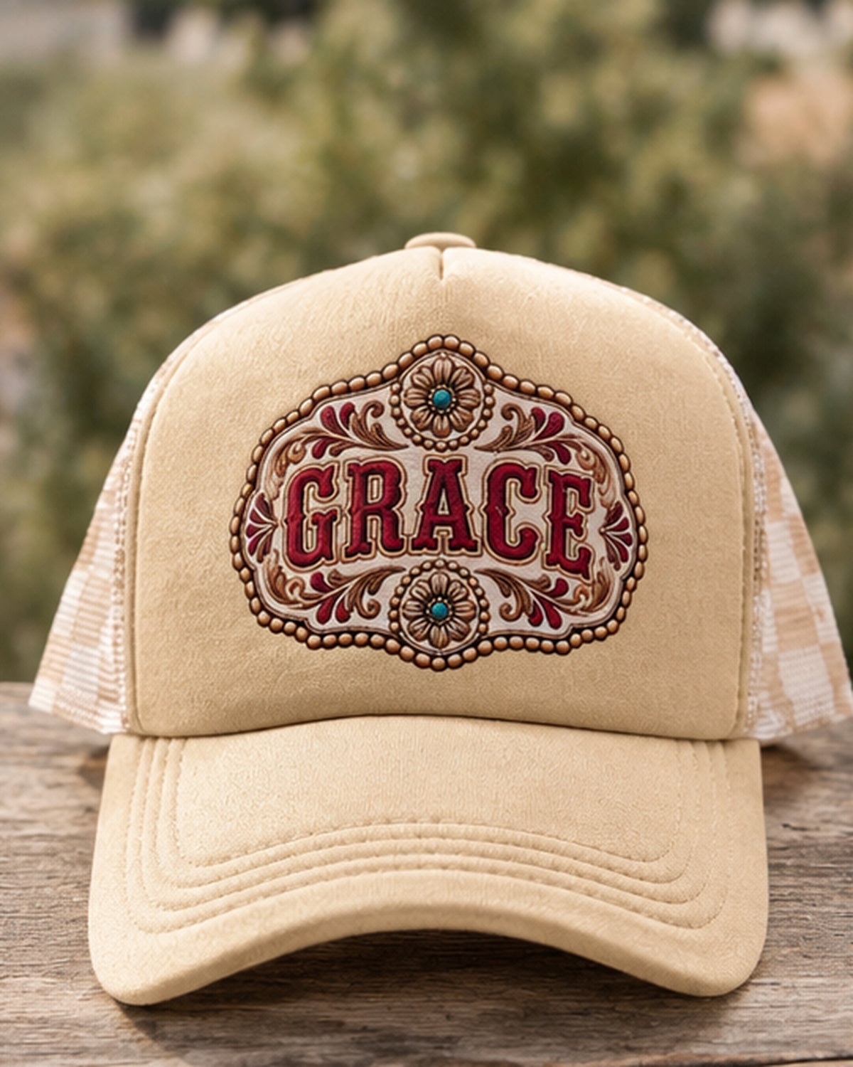 Grace tan western buckle trucker cap with burgundy lettering turquoise floral accents and beige checked mesh