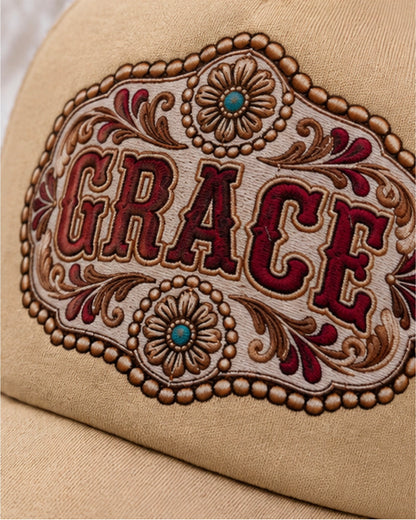 Close view Grace western buckle and turquoise accents on tan foam front